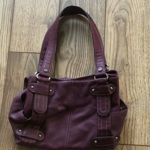 Purple pebble leather handbag